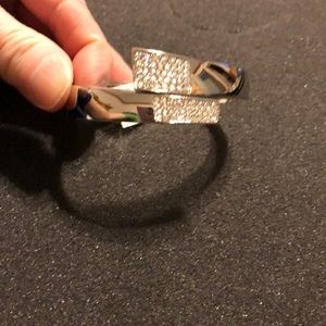 Silver expandable bracelet.